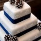 Cake with blue ribbon